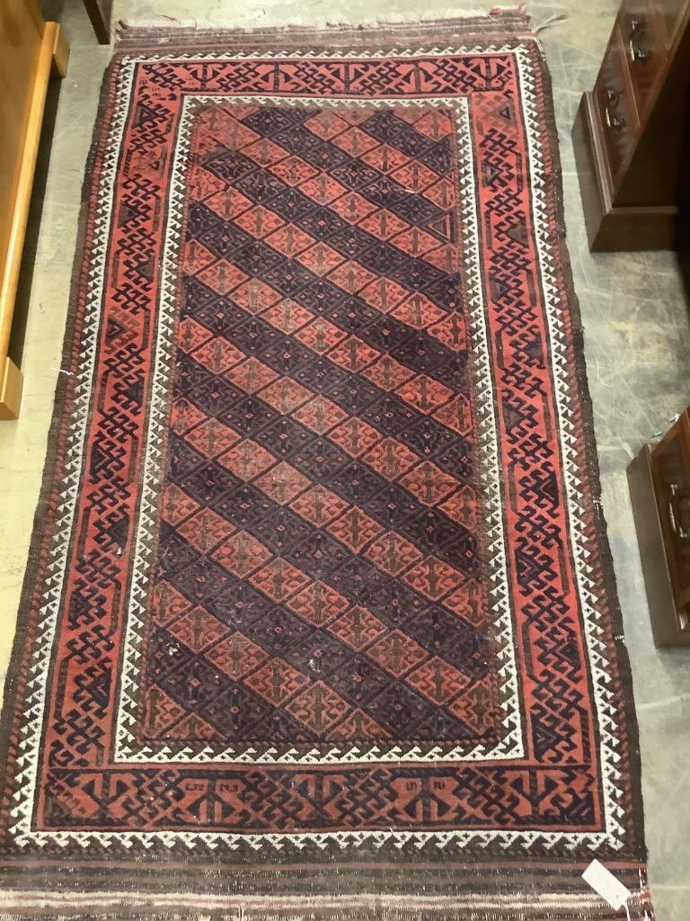 A Belouch geometric rug, 200 x 118cm